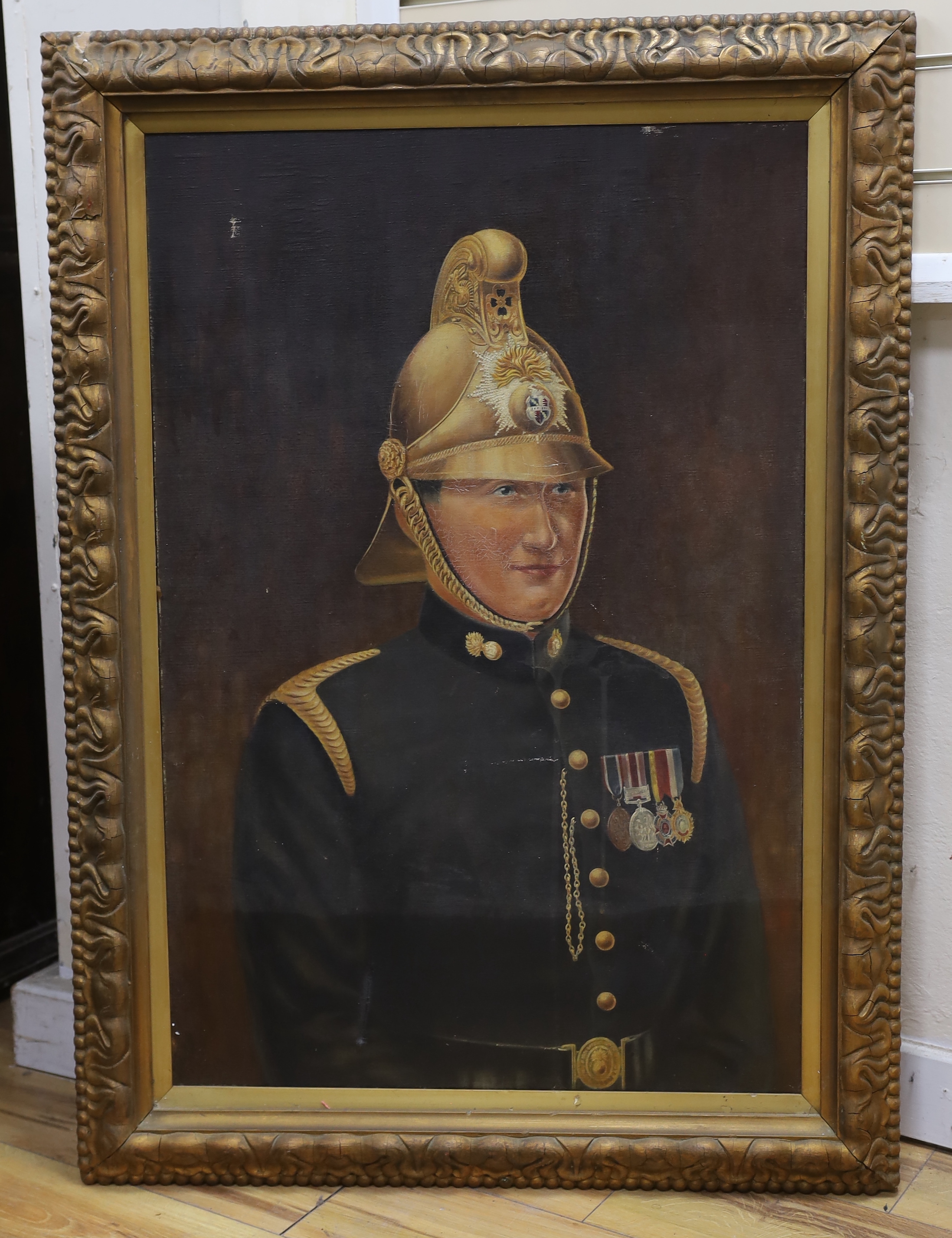 English School c.1900, oil on canvas, Portrait of a French fireman, 91 x 60cm